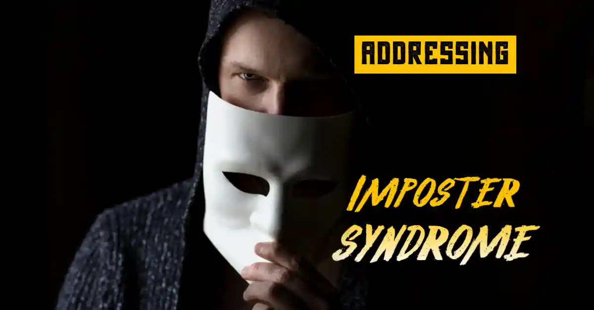 A hooded nan lowering a white mask to show half his face